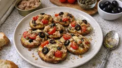 Sicilian Sheet-Pan Baked Potatoes with Tuna, Olives, Capers, and Cherry Tomatoes